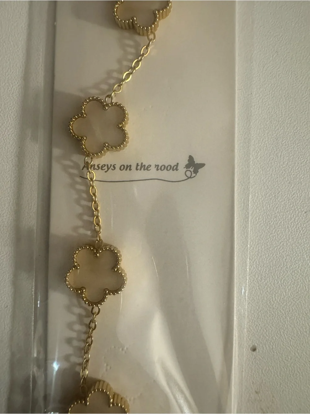 On The Road Gold Link Bracelet with White Flower Accents